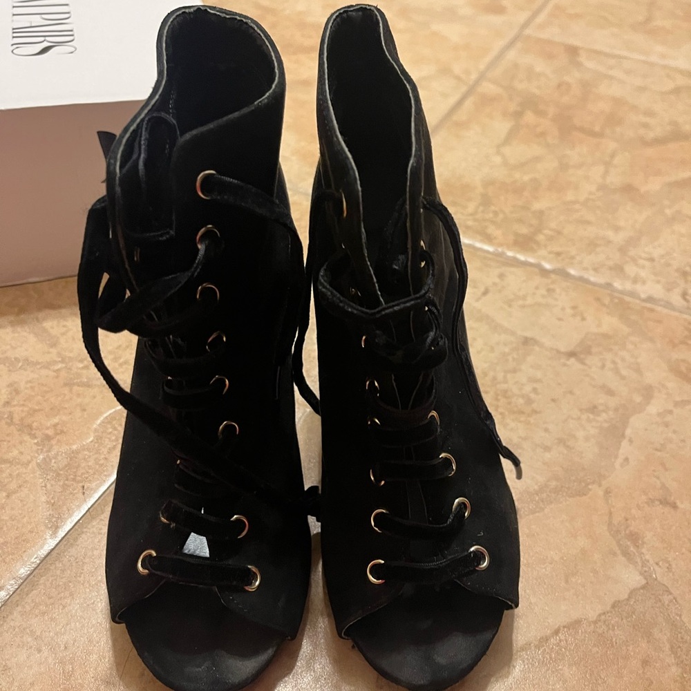 Black lace up heels.
